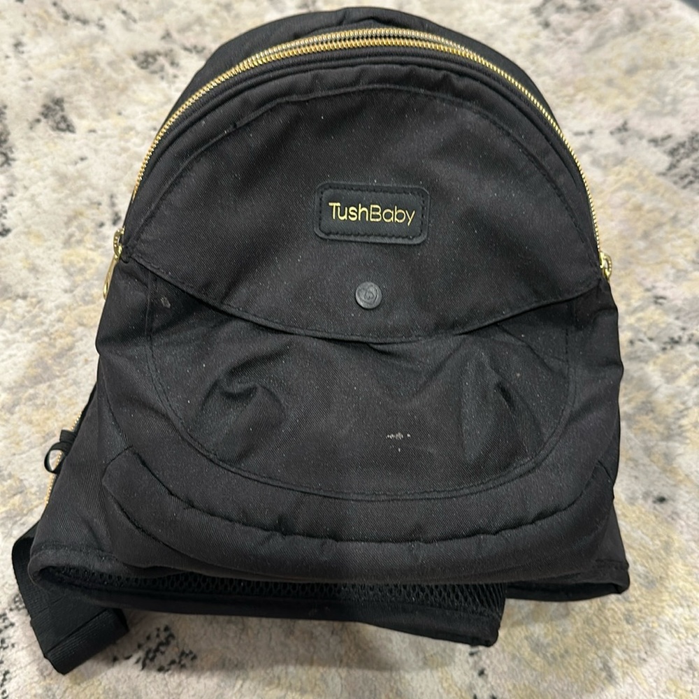 Black and gold Tush baby hip seat